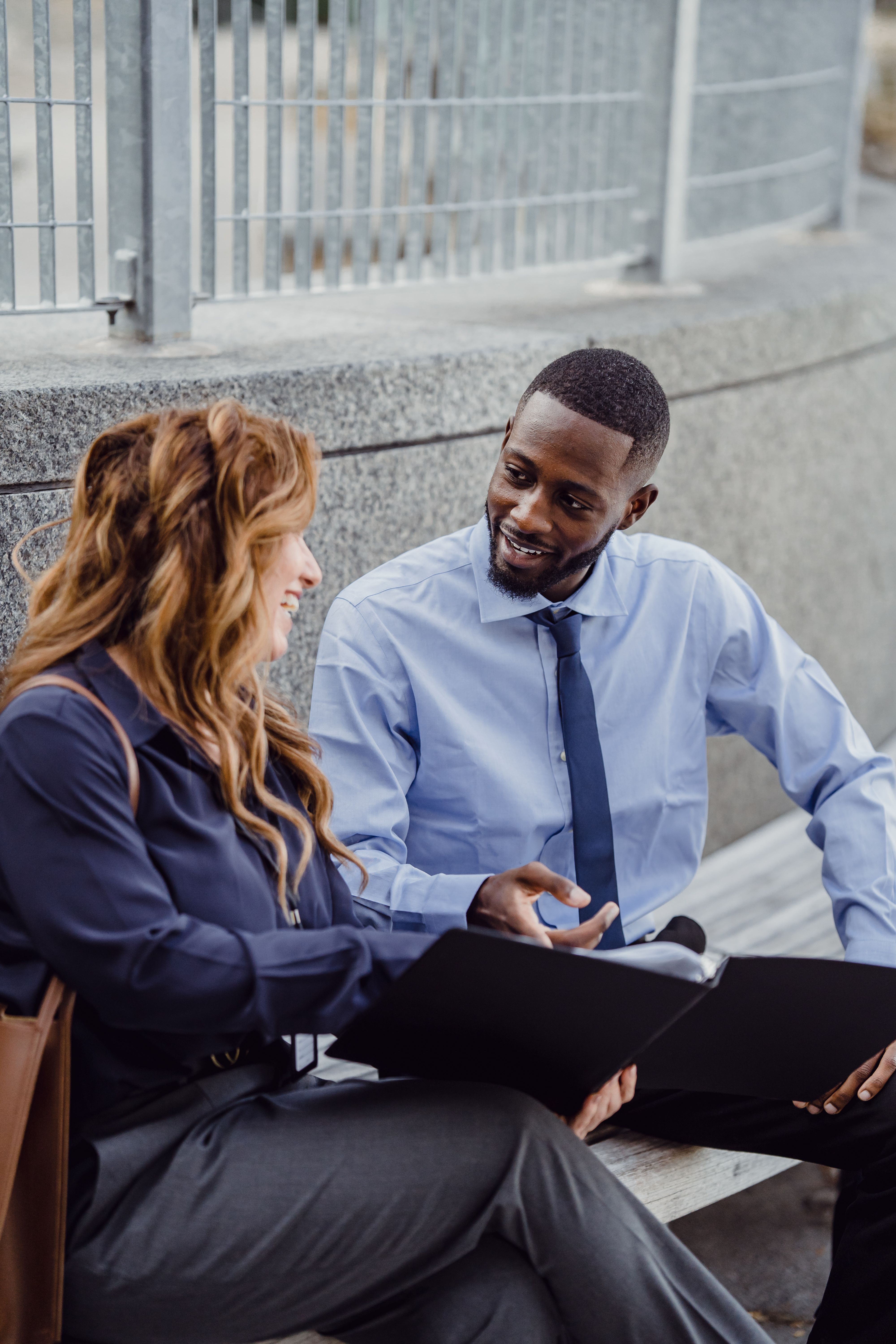 Two colleagues in professional conversation